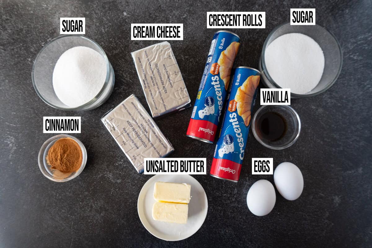 churro cheesecake ingredients in individual bowls and labeled.