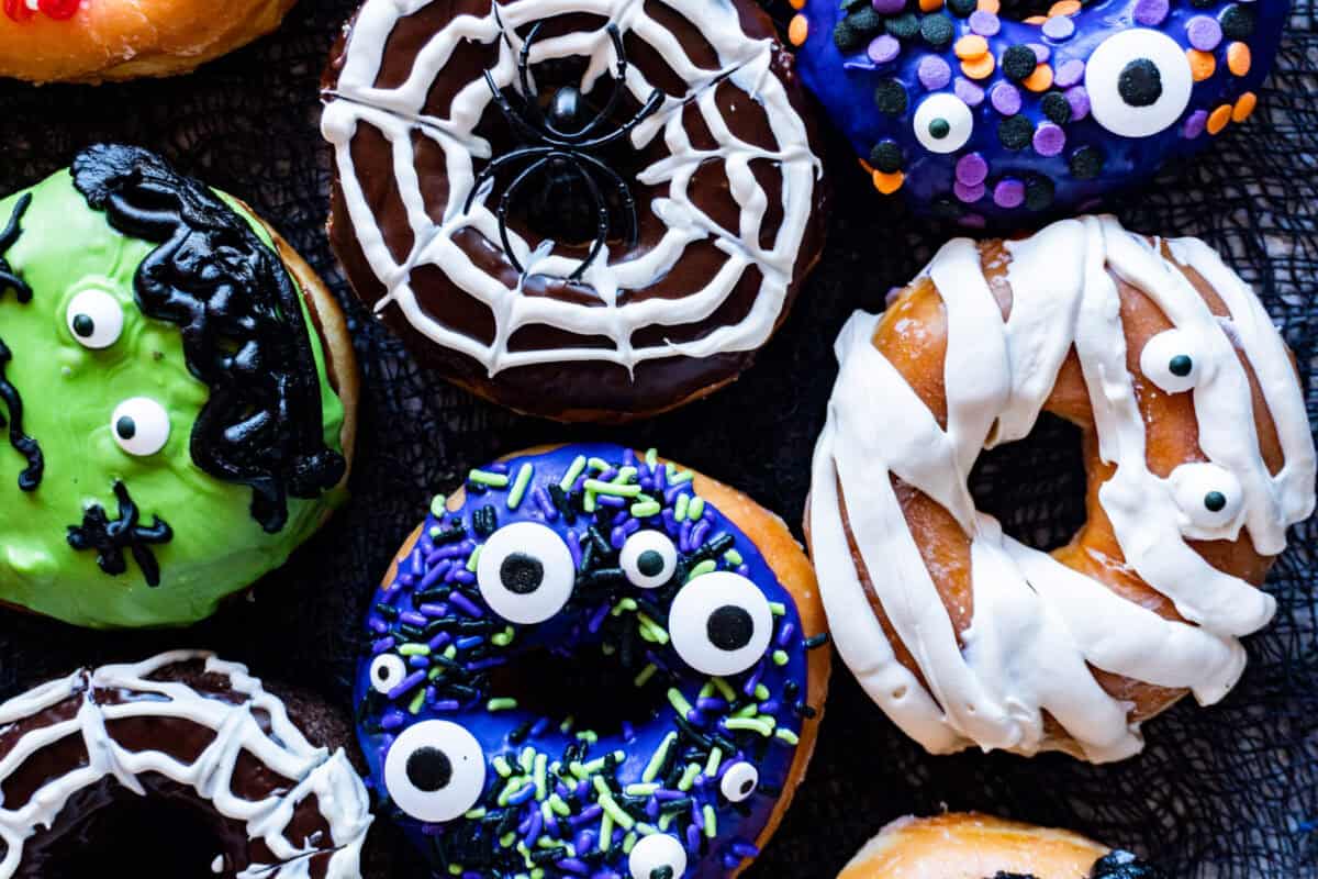 donuts decorated to look like monsters.