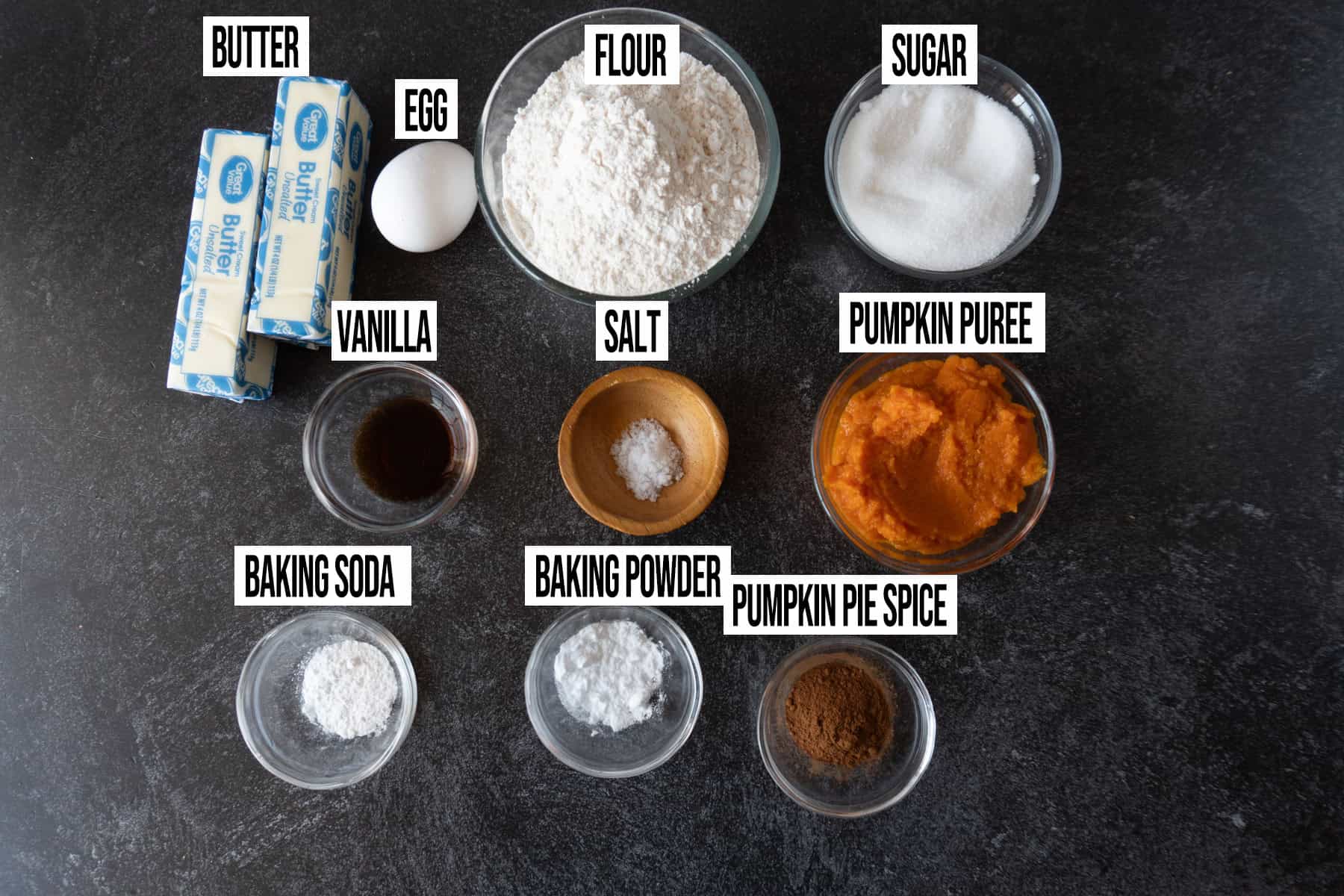 Soft Pumpkin Cookies ingredients laid out and in individual bowls and labeled.