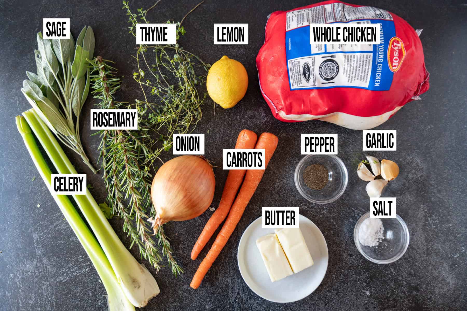 Thanksgiving chicken recipe ingredients laid out and in individual bowls and labeled.