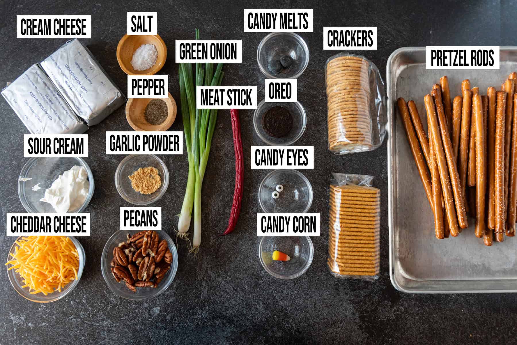 Turkey Cheeseball Ingredients laid out and in individual bowls and labeled.